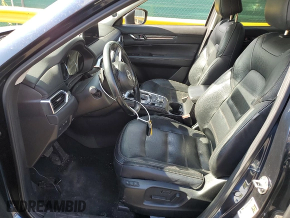 2021 Mazda CX-5 Grand Touring with VIN JM3KFBDM3M1344784, listed as a Copart auction lot 58051445 with 69,593 mi miles and Salvage title. Bid and sale history available at DreamBid. Image 7.