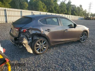 2018 Mazda 3 Touring z VIN 3MZBN1L33JM235106, wystawiony jako Copart lot #58272365 z przebiegiem 28 844 mil mil oraz Szkoda całkowita • Salvage title. Historia ofert i sprzedaży dostępna na DreamBid. Obrazek 3.