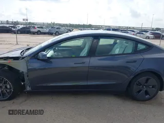 2023 Tesla Model 3 with VIN 5YJ3E1EA7PF567906, listed as a IAAI auction lot 42280993 with 41,452 mi miles and . Bid and sale history available at DreamBid. Image 15.