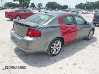 2013 Dodge Avenger R/T with VIN 1C3CDZBG4DN590183, listed as a IAAI auction lot 42178040 with 150,265 mi miles and . Bid and sale history available at carsss.com. Image 4.