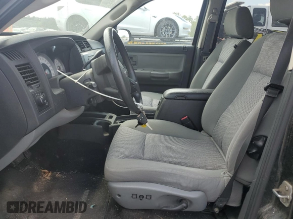 2008 Dodge Dakota SLT z VIN 1D7HW48NX8S626721, wystawiony jako Copart lot #52862855 z przebiegiem 159 605 mil mil oraz Czysty tytuł • Clean title. Historia ofert i sprzedaży dostępna na DreamBid. Obrazek 7.