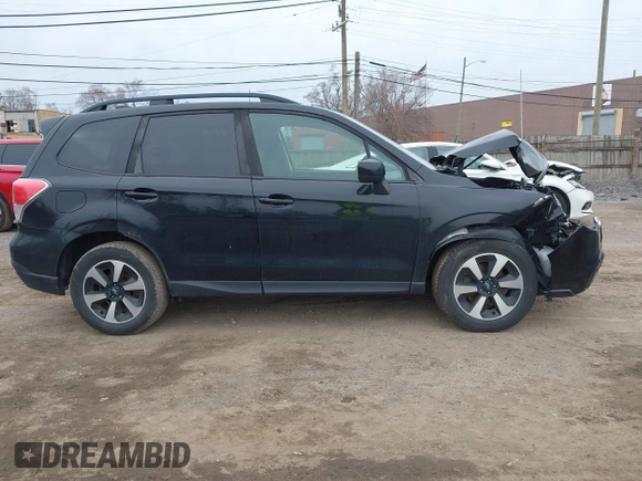2018 Subaru Forester Premium with VIN JF2SJAGC5JH608614, listed as a IAAI auction lot 41948462 with 115,671 mi miles and . Bid and sale history available at DreamBid. Image 13.