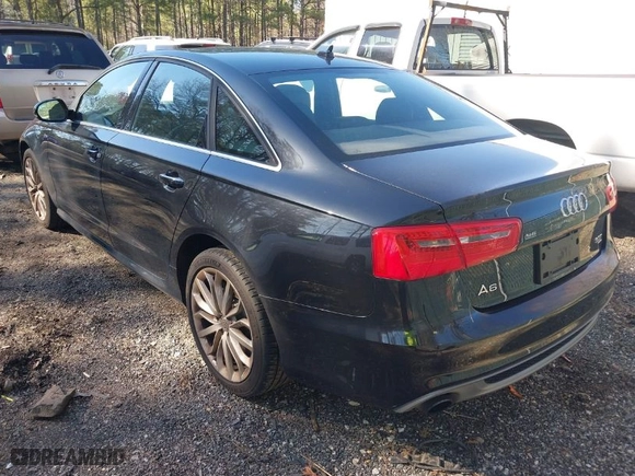 2014 Audi A6 3.0T Prestige with VIN WAUHGAFC8EN142187, listed as a IAAI auction lot 41833457 with 129,533 mi miles. Bid and sale history available at carsss.com. Image 3.