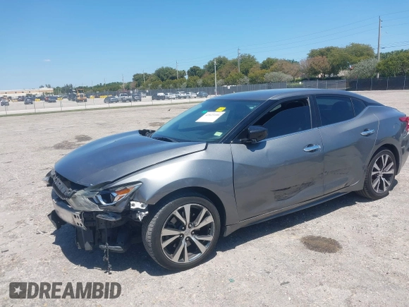 2016 Nissan Maxima SL with VIN 1N4AA6AP9GC901494, listed as a IAAI auction lot 42023106 with 160,581 mi miles and . Bid and sale history available at DreamBid. Image 18.