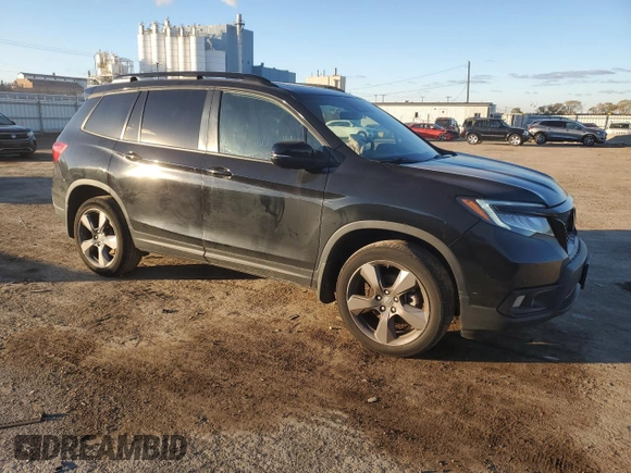 2021 Honda Passport Touring with VIN 5FNYF8H98MB019552, listed as a Copart auction lot 80360194 with 39,173 mi miles and Salvage Title. Bid and sale history available at carsss.com. Image 4.