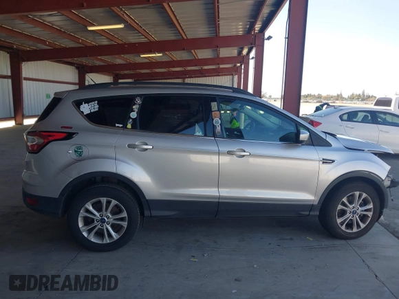2018 Ford Escape SE with VIN 1FMCU0G90JUC63679, listed as a IAAI auction lot 41658115 with 154,106 mi miles. Bid and sale history available at carsss.com. Image 14.