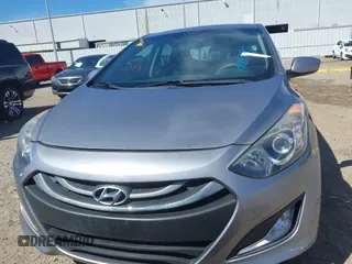 2013 Hyundai Elantra GT with VIN KMHD35LE4DU078269, listed as a IAAI auction lot 41811795 with 116,458 mi miles. Bid and sale history available at carsss.com. Image 12.