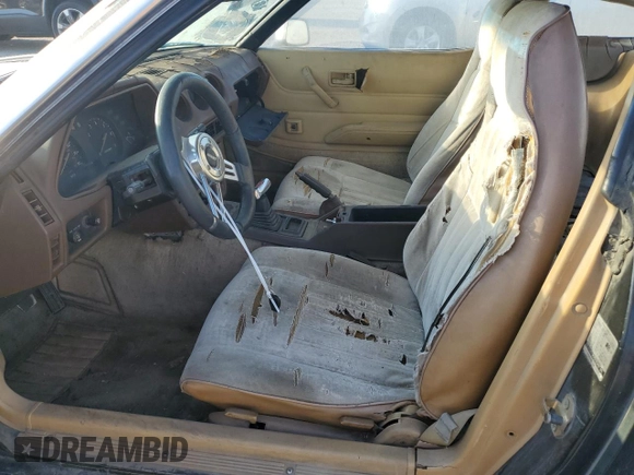 1981 Datsun 280ZX z VIN JN1HZ04S8BX265704, wystawiony jako Copart lot #71597844 z przebiegiem 251 218 mil mil oraz Tytuł czysty. Historia ofert i sprzedaży dostępna na DreamBid. Obrazek 7.