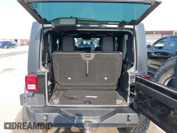 2017 Jeep Wrangler Sport with VIN 1C4AJWAG6HL654592, listed as a IAAI auction lot 42447379 with 61,585 mi miles and . Bid and sale history available at DreamBid. Image 18.