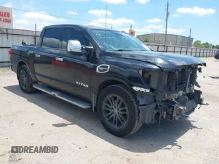 2017 Nissan Titan Platinum Reserve z VIN 1N6AA1E69HN507463, wystawiony jako IAAI lot #42173186 z przebiegiem 198 565 mil mil oraz . Historia ofert i sprzedaży dostępna na DreamBid. Obrazek 1.