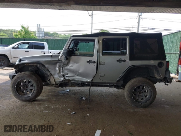 2017 Jeep Wrangler Unlimited Sport with VIN 1C4BJWDG1HL591515, listed as a IAAI auction lot 42426201 with 124,131 mi miles and . Bid and sale history available at DreamBid. Image 14.