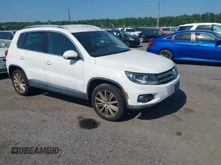 2012 Volkswagen Tiguan SE with VIN WVGBV7AX7CW527271, listed as a IAAI auction lot 42594294 with 147,594 mi miles and . Bid and sale history available at DreamBid. Image 1.