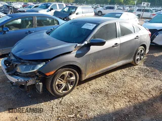 2020 Honda Civic LX with VIN 2HGFC2F67LH534381, listed as a IAAI auction lot 42056676 with 124,344 mi miles and . Bid and sale history available at DreamBid. Image 19.