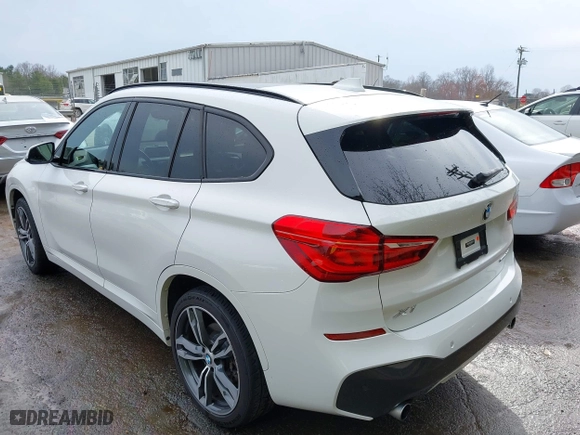 2018 BMW X1 sDrive28i with VIN WBXHU7C39J3H43185, listed as a IAAI auction lot 41798183 with 51,666 mi miles. Bid and sale history available at carsss.com. Image 3.
