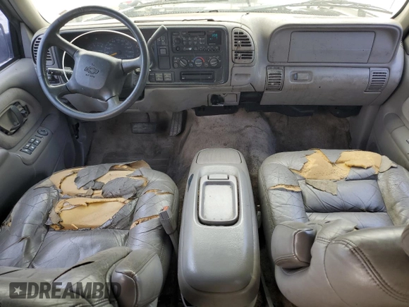 1999 Chevrolet Tahoe Z71 with VIN 1GNEK13R6XJ301562, listed as a Copart auction lot 59684595 with 200,561 mi miles and Salvage title. Bid and sale history available at DreamBid. Image 8.