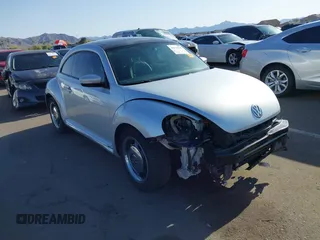 2013 Volkswagen Beetle 2.5L w/Sun/Sound/Nav with VIN 3VWJX7AT5DM606119, listed as a IAAI auction lot 41970253 with 81,004 mi miles and . Bid and sale history available at DreamBid. Image 1.