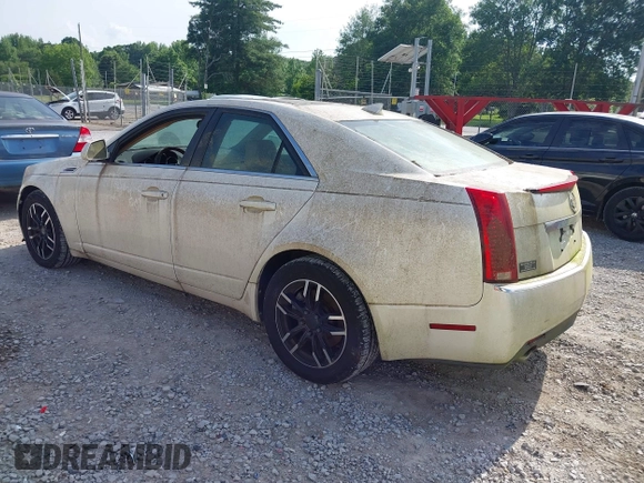 2009 Cadillac CTS RWD with VIN 1G6DF577690108865, listed as a IAAI auction lot 42314121 with 153,702 mi miles and . Bid and sale history available at DreamBid. Image 3.