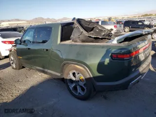 2022 Rivian R1T Adventure Package with VIN 7FCTGAAA5NN007049, listed as a Copart auction lot 74857974 with 27,481 mi miles and Salvage Title. Bid and sale history available at carsss.com. Image 2.
