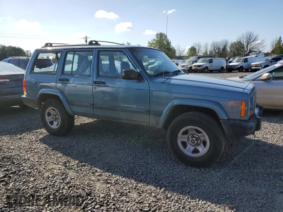 1999 Jeep Cherokee Sport with VIN 1J4FT68S1XL577603, listed as a Copart auction lot 54216115 with 180,128 mi miles and Salvage title. Bid and sale history available at DreamBid. Image 4.
