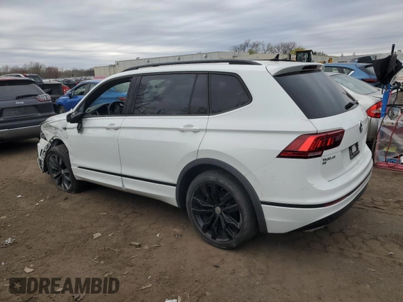 2021 Volkswagen Tiguan SE with VIN 3VV2B7AX8MM021965, listed as a Copart auction lot 53711125 with 59,554 mi miles and Salvage Title. Bid and sale history available at DreamBid. Image 2.