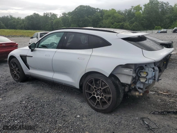2021 Aston Martin DBX with VIN SCFVUJAW8MTV01405, listed as a Copart auction lot 56564704 with 12,386 mi miles and Salvage Title. Bid and sale history available at carsss.com. Image 2.