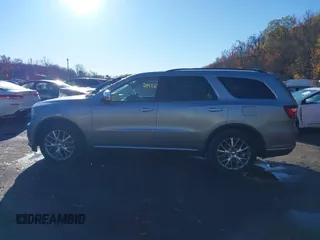 2014 Dodge Durango Citadel z VIN 1C4SDJET4EC331577, wystawiony jako IAAI lot #40923796 z przebiegiem 83 154 mil mil oraz . Historia ofert i sprzedaży dostępna na DreamBid. Obrazek 14.