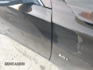 2019 Infiniti Q50 3.0t LUXE with VIN JN1EV7AP9KM512446, listed as a IAAI auction lot 41311730 with 105,000 mi miles. Bid and sale history available at carsss.com. Image 5.