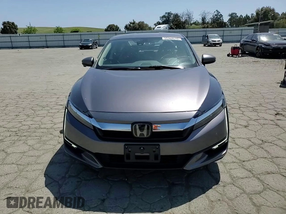 2019 Honda Clarity Touring z VIN JHMZC5F38KC007064, wystawiony jako Copart lot #55362015 z przebiegiem 74 565 mil mil oraz Szkoda całkowita • Salvage title. Historia ofert i sprzedaży dostępna na DreamBid. Obrazek 13.