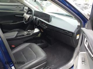 2022 Kia EV6 Wind with VIN KNDC34LA2N5049730, listed as a IAAI auction lot 41793235 with 109,806 mi miles and . Bid and sale history available at DreamBid. Image 5.