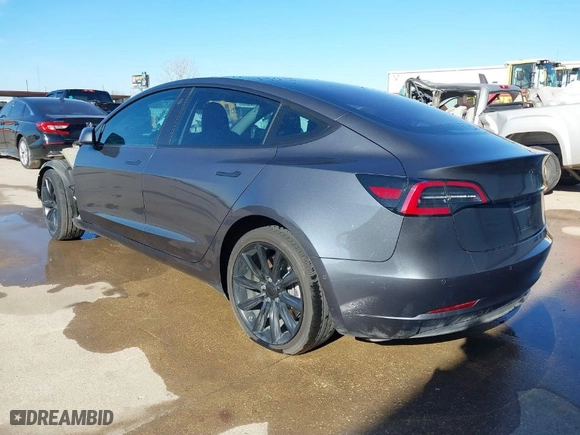 2018 Tesla Model 3 Long Range Battery with VIN 5YJ3E1EA8JF010834, listed as a IAAI auction lot 41598099 with 83,252 mi miles. Bid and sale history available at carsss.com. Image 3.
