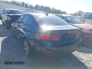 2012 BMW 3 Series 328i with VIN WBA3A5C58CF258408, listed as a IAAI auction lot 41597446 with 227,855 mi miles. Bid and sale history available at carsss.com. Image 3.