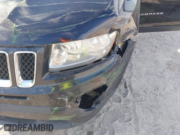 2013 Jeep Compass Sport with VIN 1C4NJCBB2DD250650, listed as a IAAI auction lot 41068228 with 148,549 mi miles. Bid and sale history available at carsss.com. Image 6.