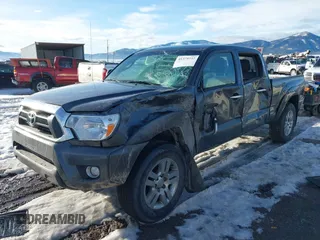 2013 Toyota Tacoma with VIN 3TMMU4FNXDM059768, listed as a IAAI auction lot 41375737 with 227,477 mi miles. Bid and sale history available at carsss.com. Image 6.