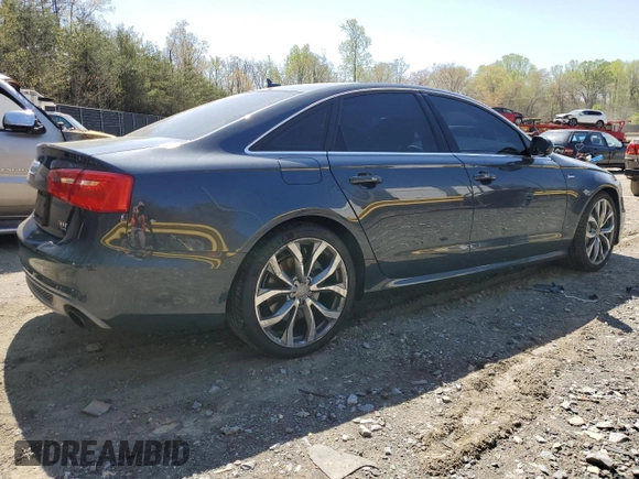 2014 Audi A6 Prestige z VIN WAUHGAFCXEN115962, wystawiony jako Copart lot #52228395 z przebiegiem 134 622 mil mil oraz Szkoda całkowita • Salvage title. Historia ofert i sprzedaży dostępna na DreamBid. Obrazek 3.