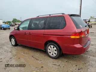 2003 Honda Odyssey EX with VIN 5FNRL18643B129670, listed as a Copart auction lot 85890784 with 222,216 mi miles and Salvage Title. Bid and sale history available at DreamBid. Image 2.