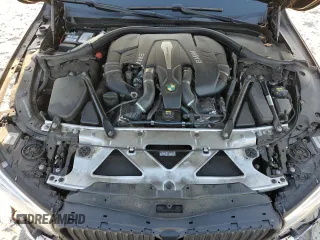 2016 BMW 7 Series 750i with VIN WBA7F0C5XGGL99048, listed as a Copart auction lot 84815364 with 96,743 mi miles and Salvage Title. Bid and sale history available at carsss.com. Image 11.