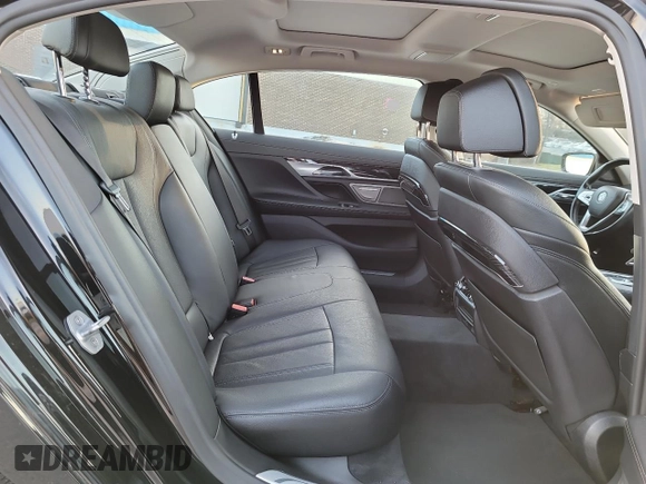 2019 BMW 7 Series 740i xDrive with VIN WBA7E4C55KGV28252, listed as a Copart auction lot 50657795 with 60,789 mi miles and Salvage title. Bid and sale history available at DreamBid. Image 6.