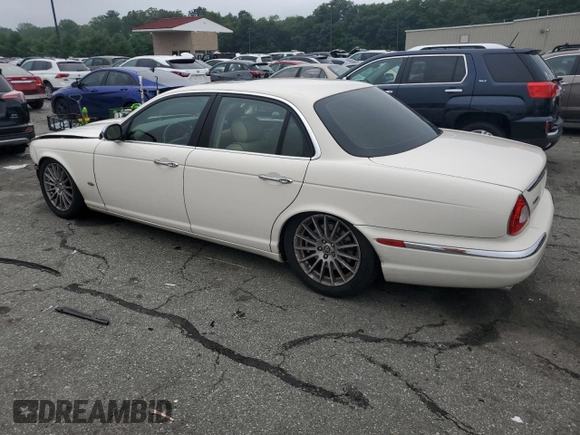 2007 Jaguar XJ with VIN SAJWA71B67SH12726, listed as a Copart auction lot 64840394 with 71,363 mi miles and Salvage Title. Bid and sale history available at carsss.com. Image 2.