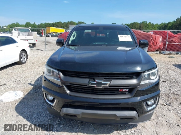 2018 Chevrolet Colorado 2WD Z71 with VIN 1GCGSDEN3J1309462, listed as a IAAI auction lot 42632940 with 85,886 mi miles and . Bid and sale history available at DreamBid. Image 12.