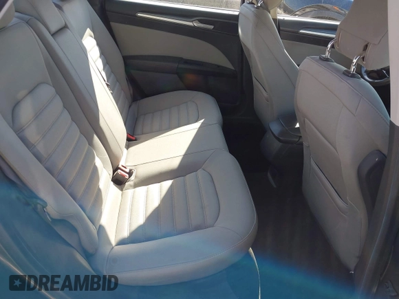 2014 Ford Fusion S with VIN 1FA6P0G79E5360991, listed as a IAAI auction lot 41884597 with 244,786 mi miles and . Bid and sale history available at DreamBid. Image 8.