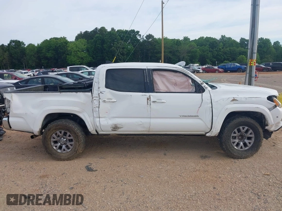 2017 Toyota Tacoma SR5 z VIN 5TFAZ5CN9HX040563, wystawiony jako IAAI lot #42274119 z przebiegiem 244 422 mil mil oraz . Historia ofert i sprzedaży dostępna na DreamBid. Obrazek 13.