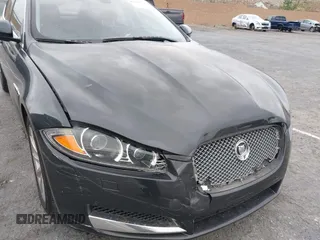 2013 Jaguar XF I4 RWD with VIN SAJWA0ES0DPS64027, listed as a IAAI auction lot 41569121 with 103,115 mi miles. Bid and sale history available at carsss.com. Image 6.