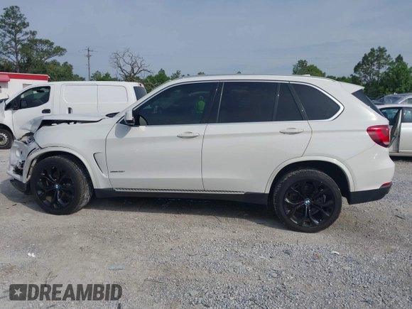2016 BMW X5 xDrive35i z VIN 5UXKR0C55G0P32557, wystawiony jako IAAI lot #42235246 z przebiegiem 104 947 mil mil oraz . Historia ofert i sprzedaży dostępna na DreamBid. Obrazek 14.