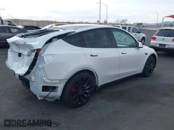 2023 Tesla Model Y Performance with VIN 7SAYGDEFXPF589477, listed as a IAAI auction lot 41936981 with 28,993 mi miles and . Bid and sale history available at DreamBid. Image 4.