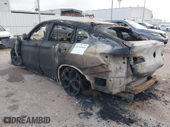2020 BMW X4 xDrive30i with VIN 5UX2V1C00L9B30132, listed as a IAAI auction lot 41769464 with Not provided miles and . Bid and sale history available at DreamBid. Image 3.