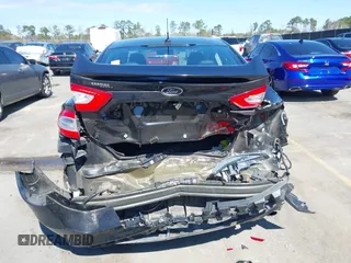 2013 Ford Fusion Titanium Hybrid with VIN 3FA6P0RU2DR288773, listed as a IAAI auction lot 41803708 with 85,868 mi miles and . Bid and sale history available at DreamBid. Image 16.
