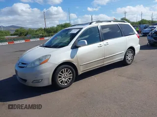 2010 Toyota Sienna XLE with VIN 5TDYK4CC3AS336590, listed as a IAAI auction lot 41798194 with 230,707 mi miles. Bid and sale history available at carsss.com. Image 2.