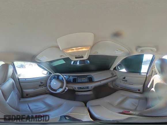 2005 Ford Crown Victoria LX z VIN 2FAFP74WX5X166506, wystawiony jako Copart lot #52141265 z przebiegiem 117 686 mil mil oraz Szkoda całkowita • Salvage title. Historia ofert i sprzedaży dostępna na DreamBid. Obrazek 13.