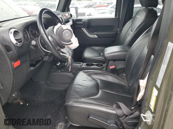 2015 Jeep Wrangler Unlimited Rubicon Hard Rock z VIN 1C4HJWFG8FL681796, wystawiony jako Copart lot #56391915 z przebiegiem 74 529 mil mil oraz Szkoda całkowita • Salvage title. Historia ofert i sprzedaży dostępna na DreamBid. Obrazek 7.