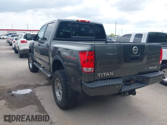 2011 Nissan Titan Pro-4X with VIN 1N6BA0EC3BN320795, listed as a IAAI auction lot 41868113 with 183,919 mi miles and . Bid and sale history available at DreamBid. Image 3.